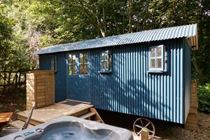Shepherds Hut now with deck and hot-tub in place